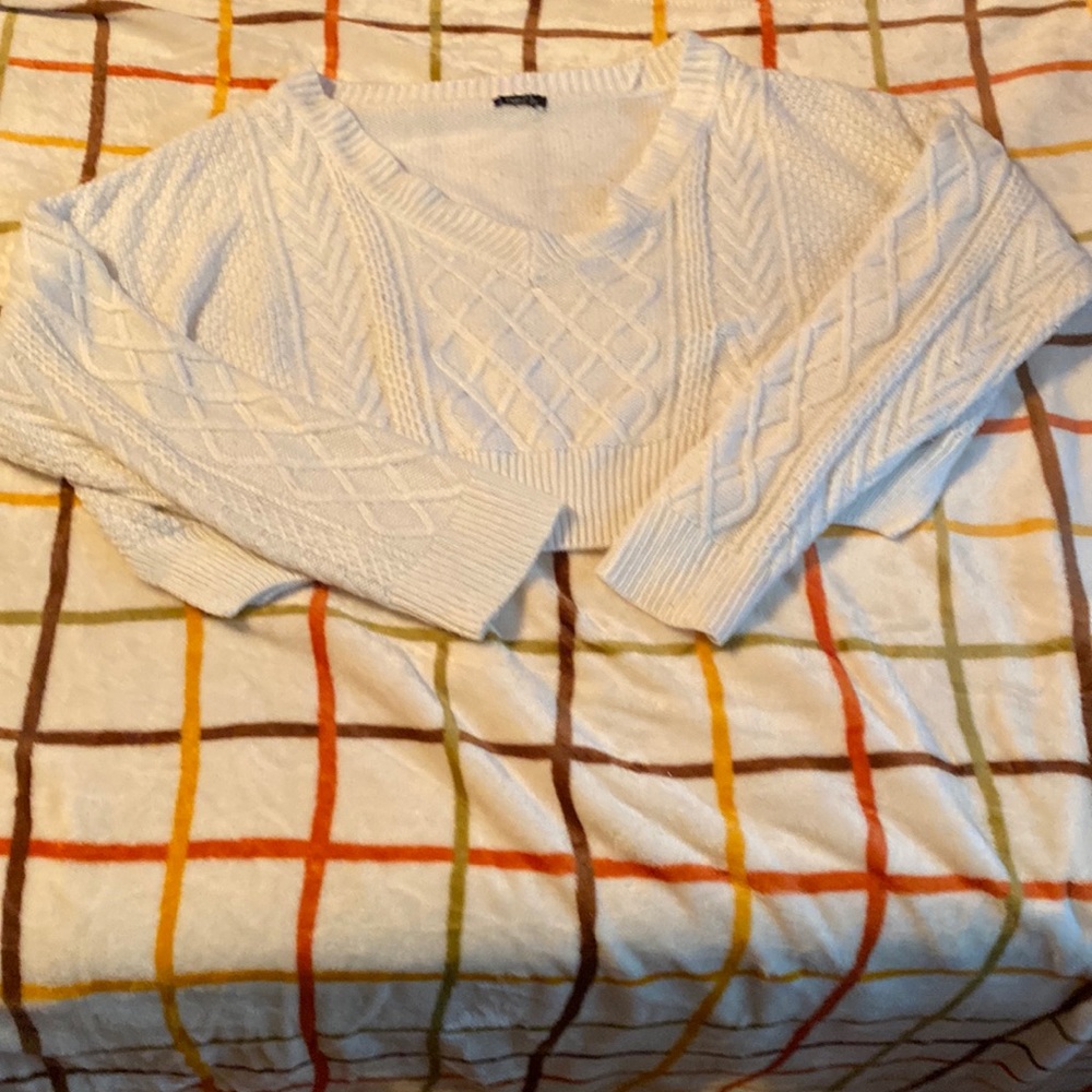 White knitted sweater